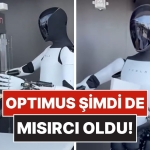 teslanin-insansi-robotu-optimus-sirket-yemeginde-patlamis-misir-dagitti-kbJN2z1C.jpg