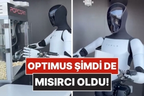 teslanin-insansi-robotu-optimus-sirket-yemeginde-patlamis-misir-dagitti-kbJN2z1C.jpg